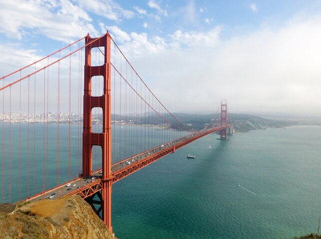 Experience sweeping views of the Golden Gate Bridge connecting you to the lush landscapes of Muir Woods and the charming seaside town of Sausalito perfect for exploration and relaxation.